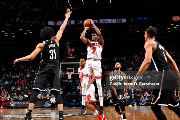 Justin Holiday of the Chicago Bulls shoots the ball during the game against the Brooklyn Nets on April 9, 2018 at Barclays Center in Brooklyn, New...