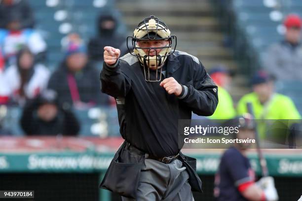 Home plate umpire Jeff Nelson calls a strike during the fifth inning of the Major League Baseball game between the Detroit Tigers and Cleveland...