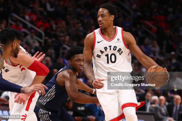 DeMar DeRozan of the Toronto Raptors drives around Stanley Johnson of the Detroit Pistons during the second half at Little Caesars Arena on April 9,...