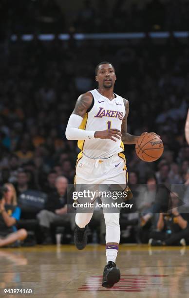 Kentavious Caldwell-Pope of the Los Angeles Lakers brings the ball up the floor in the first half at Staples Center on April 8, 2018 in Los Angeles,...