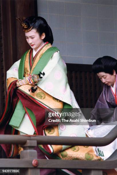 Kiko Kawashima in traditional Juni-Hitoe kimono arrives at the Kashikodokoro sanctuary during the 'Kekkon-no-Gi' wedding ceremony with Prince...
