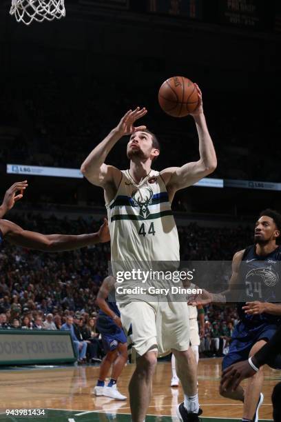 Milwaukee, WI Tyler Zeller of the Milwaukee Bucks handles the ball against the Orlando Magic on April 9, 2018 at the BMO Harris Bradley Center in...