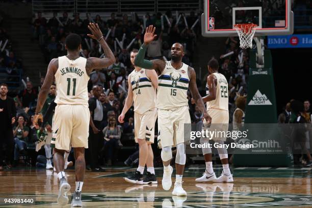 Milwaukee, WI Shabazz Muhammad of the Milwaukee Bucks and Brandon Jennings of the Milwaukee Bucks high five during the game against the Orlando Magic...
