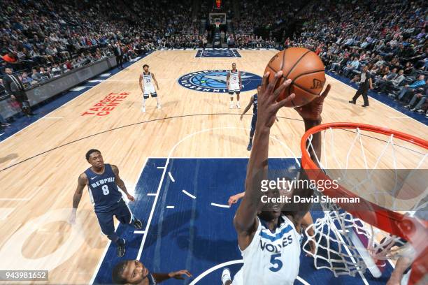 Gorgui Dieng of the Minnesota Timberwolves dunks the ball against the Memphis Grizzlies on April 9, 2018 at Target Center in Minneapolis, Minnesota....