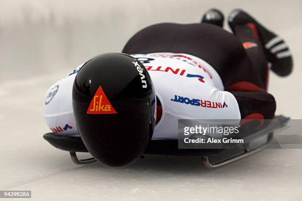 Tomass Dukurs of Latvia competes in his first run of the skeleton competition during the FIBT Bob & Skeleton World Cup at the bob run on December 11,...