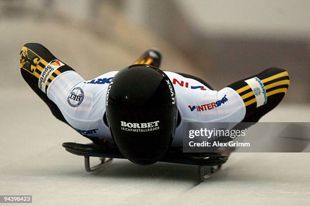 Sandro Stielicke of Germany competes in his first run of the skeleton competition during the FIBT Bob & Skeleton World Cup at the bob run on December...