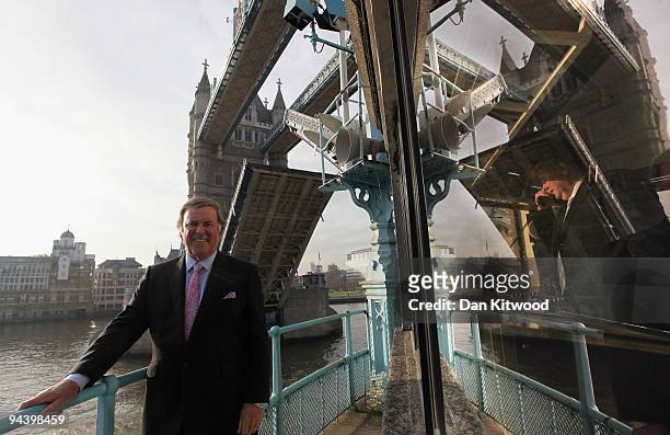 Sir Terry Wogan poses for a picture on London's Tower Bridge on December 14, 2009 in London, England. Sir Terry was invited to raise the bridge after...
