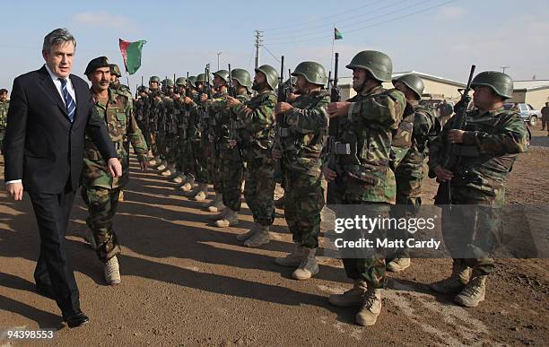 Prime Minister Gordon Brown arrives to meet British and Afghan troops at the Shorabak training camp on December 13, 2009 near Camp Bastion,...