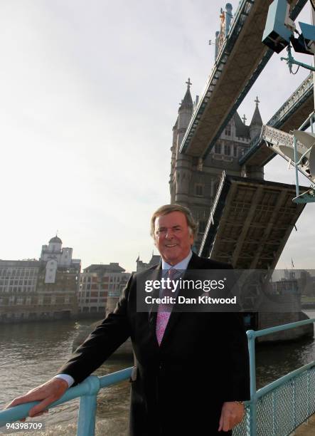 Sir Terry Wogan poses for a picture on London's Tower Bridge on December 14, 2009 in London, England. Sir Terry was invited to raise the bridge after...