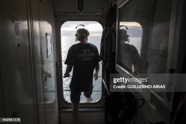 Farley Mowat crew member Guy steps out to the deck of the ship while navigating near San Felipe, in the Gulf of California, Baja California state,...