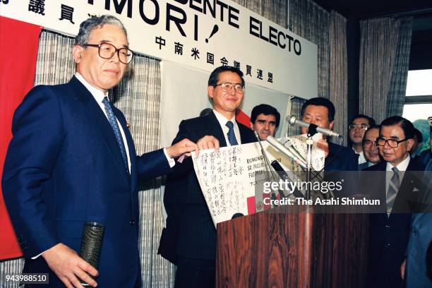 Peruvian incoming president Alberto Fujimori attends the party celebrating his victory in the presidential election with Japanese lawmakers on July...