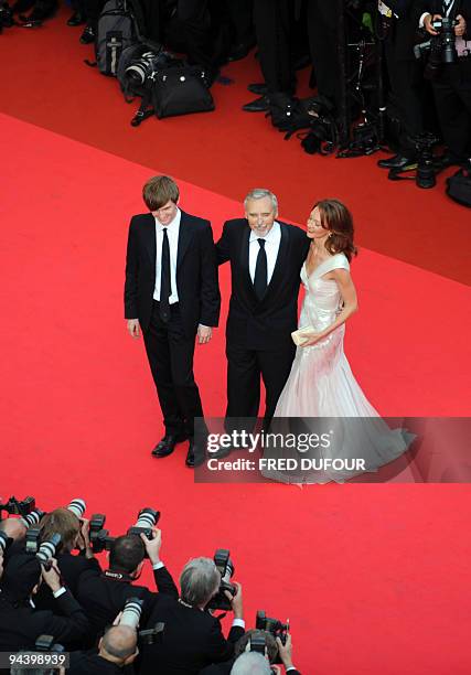 Actor and director Dennis Hopper poses with his son actor Henry Lee Hopper and wife actress Victoria Duffy as they arrive to attend the opening...