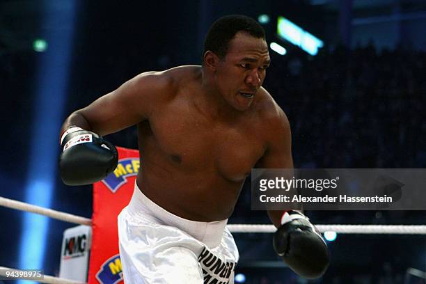 Joseph Marwa of Tanzania exchange punches with Nuri Seferi of Switzerland during their Cruiserweight fight at Postfinance-Arena on December 12, 2009...