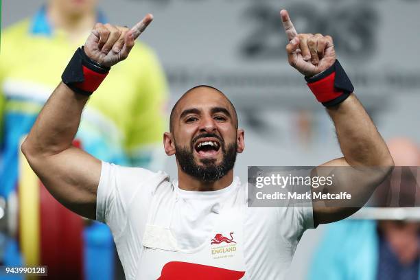 Ali Jawad of England celebrates a lift in the Men's Lightweight Final during the Para Powerlifting on day six of the Gold Coast 2018 Commonwealth...