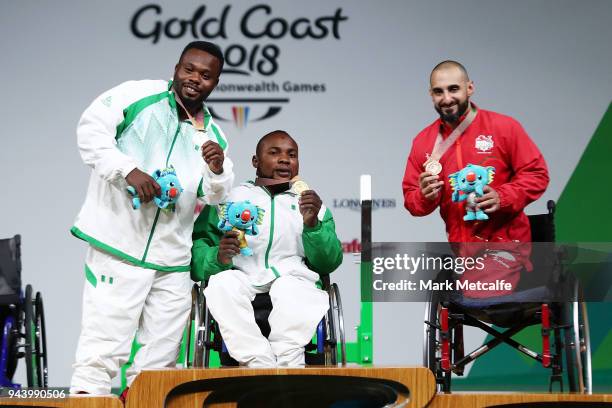 Silver medalist Paul Kehinde of Nigeria, gold medalist Roland Ezuruike of Nigeria and bronze medalist Ali Jawad of England pose during the medal...