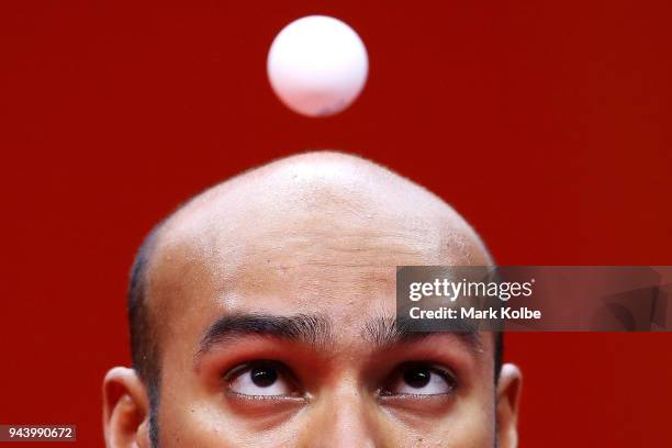 Rhikesh Taucoory of Mauritius serves during his Men's Singles Group 16 - Game 1 Table Tennis match against Craig Howieson of Scotland on day six of...