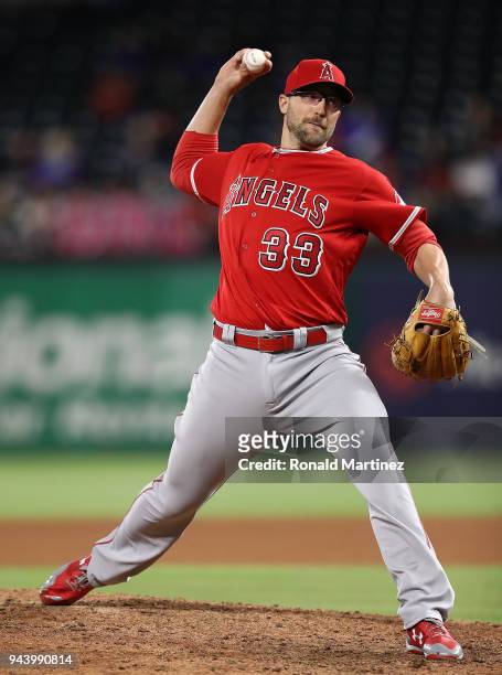 Jim Johnson of the Los Angeles Angels throws against the Texas Rangers in the seventh inning at Globe Life Park in Arlington on April 9, 2018 in...