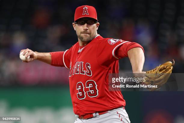 Jim Johnson of the Los Angeles Angels throws against the Texas Rangers in the seventh inning at Globe Life Park in Arlington on April 9, 2018 in...