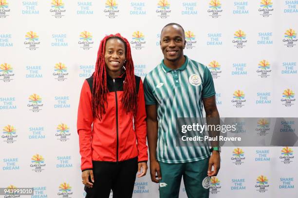 Women's 100m gold medallist Michelle-Lee Ahye of Trinidad and Tobago poses for a photo with the Men's 100m gold medallist Akani Simbine of South...