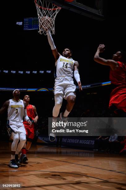 Gary Harris of the Denver Nuggets goes to the basket against the Portland Trail Blazers on April 9, 2018 at the Pepsi Center in Denver, Colorado....