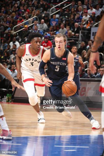 Luke Kennard of the Detroit Pistons handles the ball against OG Anunoby of the Toronto Raptors on April 9, 2018 at Little Caesars Arena in Detroit,...
