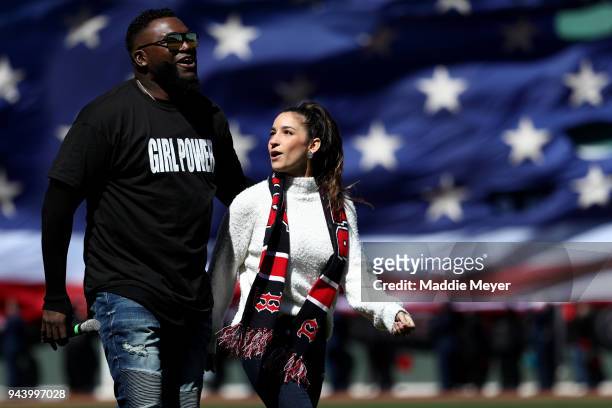 Former Red Sox player David Ortiz with American Olympic gymnast Aly Raisman before the Red Sox home opening game against the Tampa Bay Rays at Fenway...