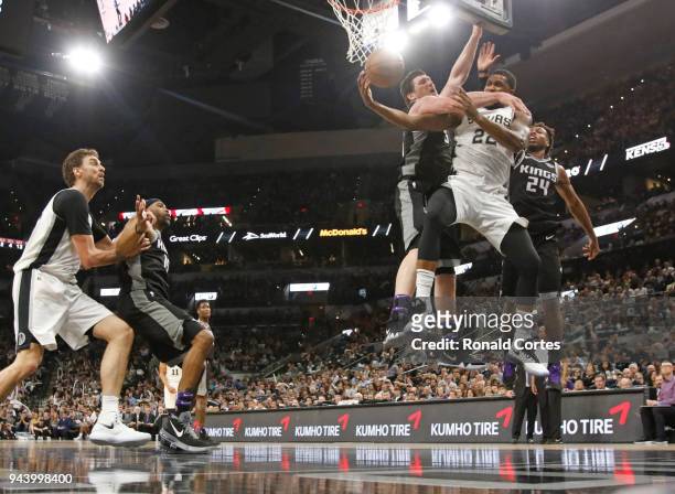 Rudy Gay of the San Antonio Spurs is fouled by Jack Cooley of the Sacramento Kings at AT&T Center on April 9 , 2018 in San Antonio, Texas. NOTE TO...