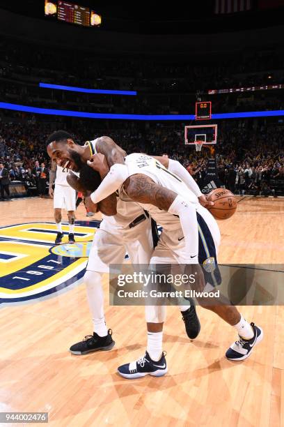 Gary Harris and Will Barton of the Denver Nuggets celebrate after winning the game against the Portland Trail Blazers on APRIL 9, 2018 at the Pepsi...