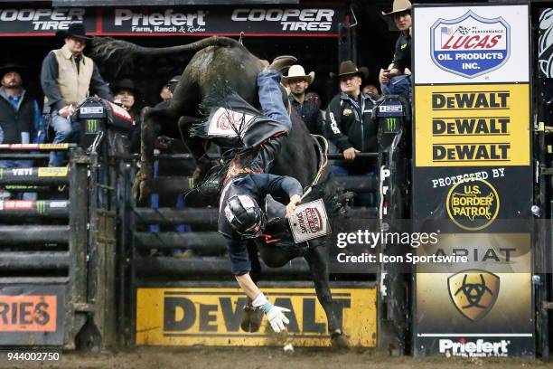 Claudio Montanha Jr. Gets bucked from bull Rising Sun during Championship round of the 25th Professional Bull Riders Unleash The Beast, on April 8 at...