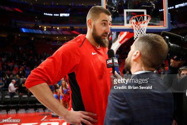 Jonas Valanciunas of the Toronto Raptors speaks with media after the game against the Detroit Pistons on April 9, 2018 at Little Caesars Arena in...