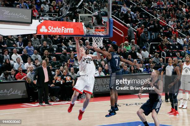 Jakob Poeltl of the Toronto Raptors handles the ball against the Detroit Pistons on April 9, 2018 at Little Caesars Arena in Detroit, Michigan. NOTE...