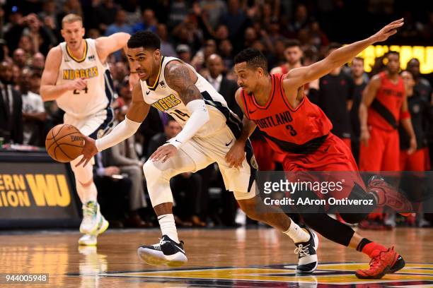 Gary Harris of the Denver Nuggets makes a game-clinching steal against CJ McCollum of the Portland Trail Blazers during the second half of the...