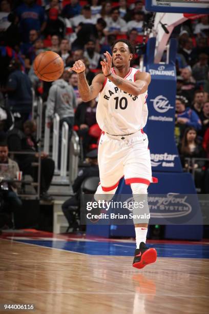 DeMar DeRozan of the Toronto Raptors passes the ball against the Detroit Pistons on April 9, 2018 at Little Caesars Arena in Detroit, Michigan. NOTE...