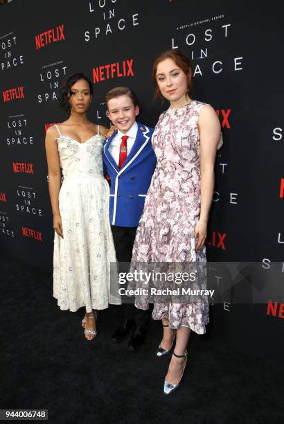 Taylor Russell, Maxwell Jenkins, and Mina Sundwall attend Netflix's "Lost In Space" Los Angeles premiere on April 9, 2018 in Los Angeles, California.