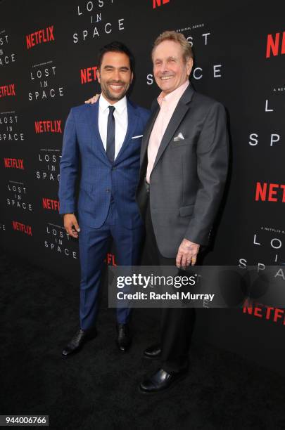 Ignacio Serricchio and Mark Goddard attend Netflix's "Lost In Space" Los Angeles premiere on April 9, 2018 in Los Angeles, California.