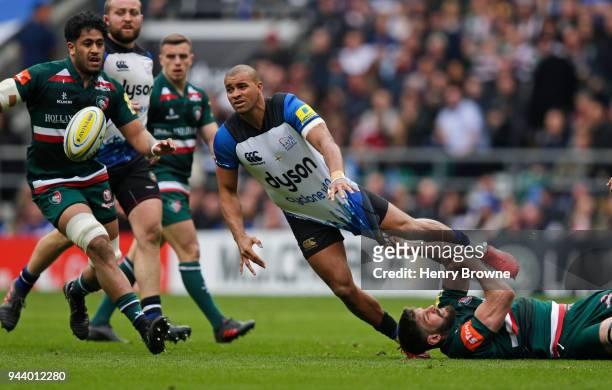 Jonathan Joseph of Bath Rugby tackled by Mike Fitzgerald of Leicester Tigers during the Aviva Premiership match between Bath Rugby and Leicester...