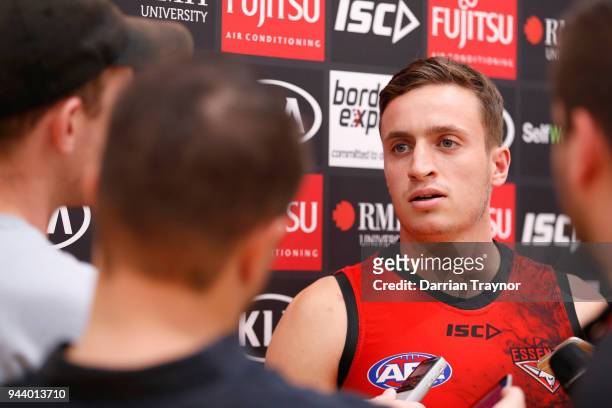 Orazio Fantasia of the Bombers speaks to the media before an Essendon Bombers AFL training session at the Essendon Football Club on April 10, 2018 in...