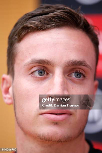 Orazio Fantasia of the Bombers speaks to the media before an Essendon Bombers AFL training session at the Essendon Football Club on April 10, 2018 in...