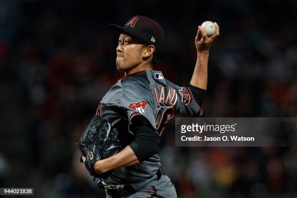 Yoshihisa Hirano of the Arizona Diamondbacks pitches against the San Francisco Giants during the eighth inning at AT&T Park on April 9, 2018 in San...
