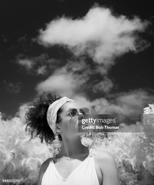 portrait of a young mixed race woman, infrared - infrared stockfoto's en -beelden