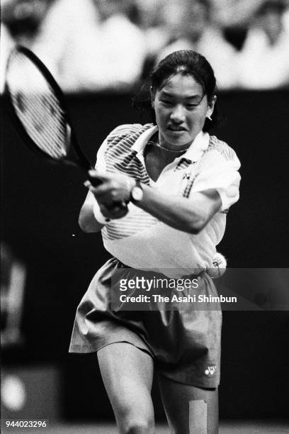Kimiko Date of Japan plays a backhand during the Women's semi final against Gabriela Sabatini of Argentine during the Gunze World Tennis at the Tokyo...