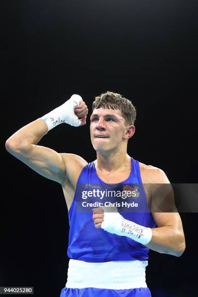 Luke McCormack of England celebrates winning against Liam Wilson of Australia in the Men's 64kg Quarterfinal Boxing on day six of the Gold Coast 2018...