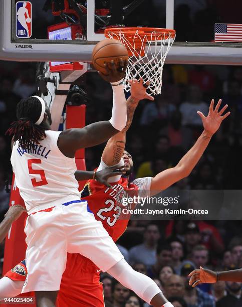 Montrezl Harrell of the Los Angeles Clippers goes up for a basket against Anthony Davis of the New Orleans Pelicans in the second half of the game at...