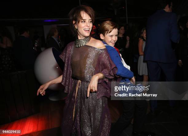 Parker Posey and Maxwell Jenkins attend Netflix's "Lost In Space" Los Angeles premiere on April 9, 2018 in Los Angeles, California.
