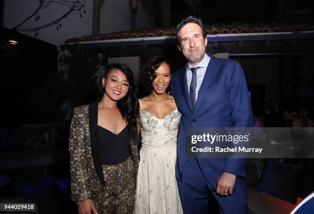 Kiki Sukezane, Taylor Russell, and Zack Estrin attend Netflix's "Lost In Space" Los Angeles premiere on April 9, 2018 in Los Angeles, California.