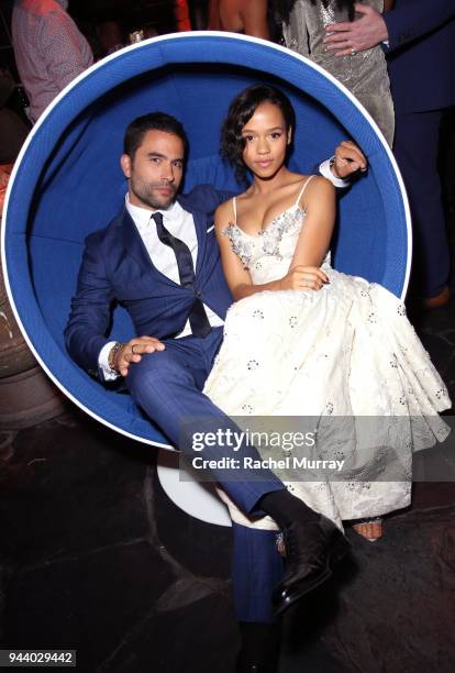 Ignacio Serricchio and Taylor Russell attend Netflix's "Lost In Space" Los Angeles premiere on April 9, 2018 in Los Angeles, California.