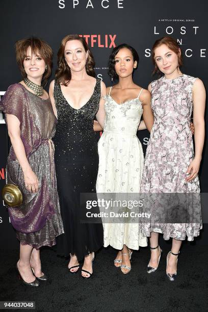 Parker Posey, Molly Parker, Taylor Russell and Mina Sundwall attend the "Lost In Space" Season 1 Premiere at ArcLight Cinerama Dome on April 9, 2018...