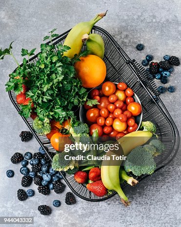A basket of fresh vegetables, and fruits A basket of fresh vegetables, and fruits