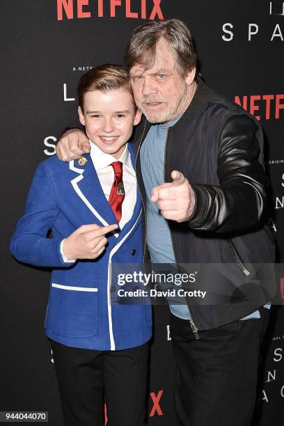 Maxwell Jenkins and Mark Hamill attend the "Lost In Space" Season 1 Premiere at ArcLight Cinerama Dome on April 9, 2018 in Hollywood, California.