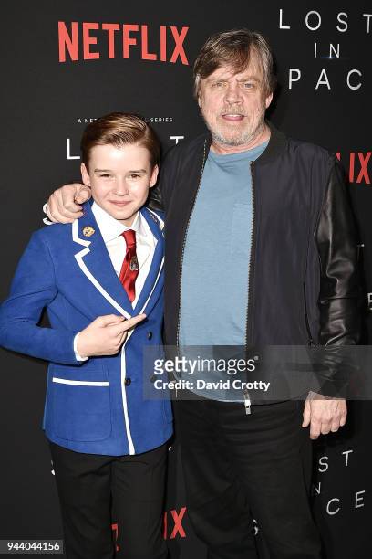 Maxwell Jenkins and Mark Hamill attend the "Lost In Space" Season 1 Premiere at ArcLight Cinerama Dome on April 9, 2018 in Hollywood, California.